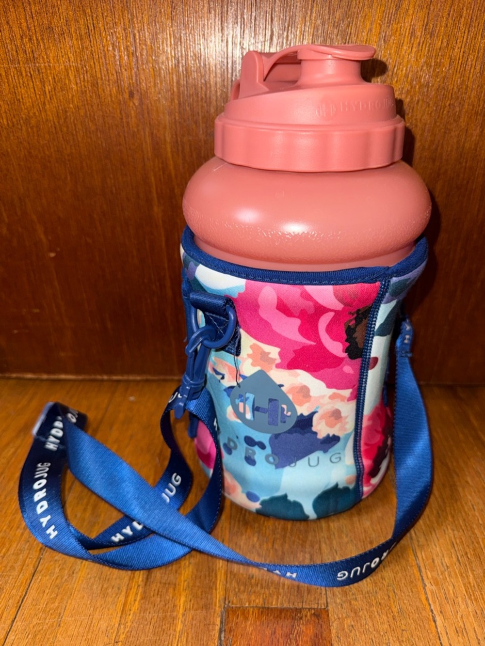 HydroJug Pink Top Floral Neoprene Bottle Holder with Blue Strap
